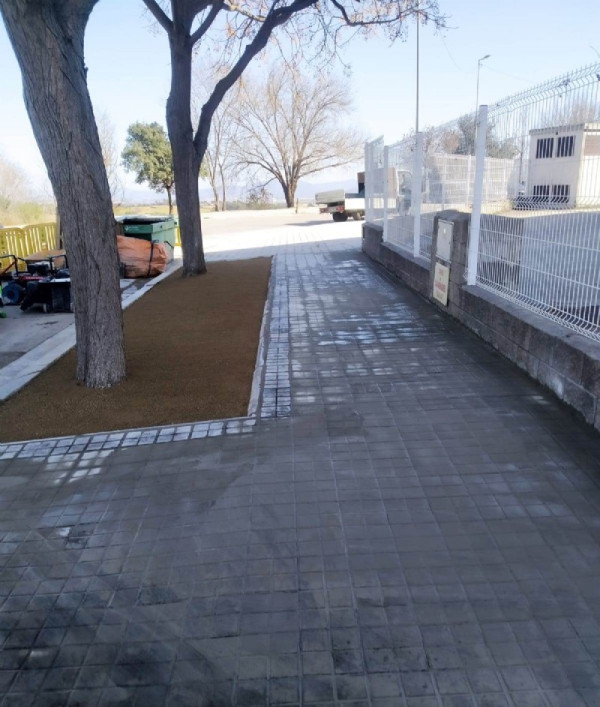 Millores a la vorera del carrer de Can Moragues